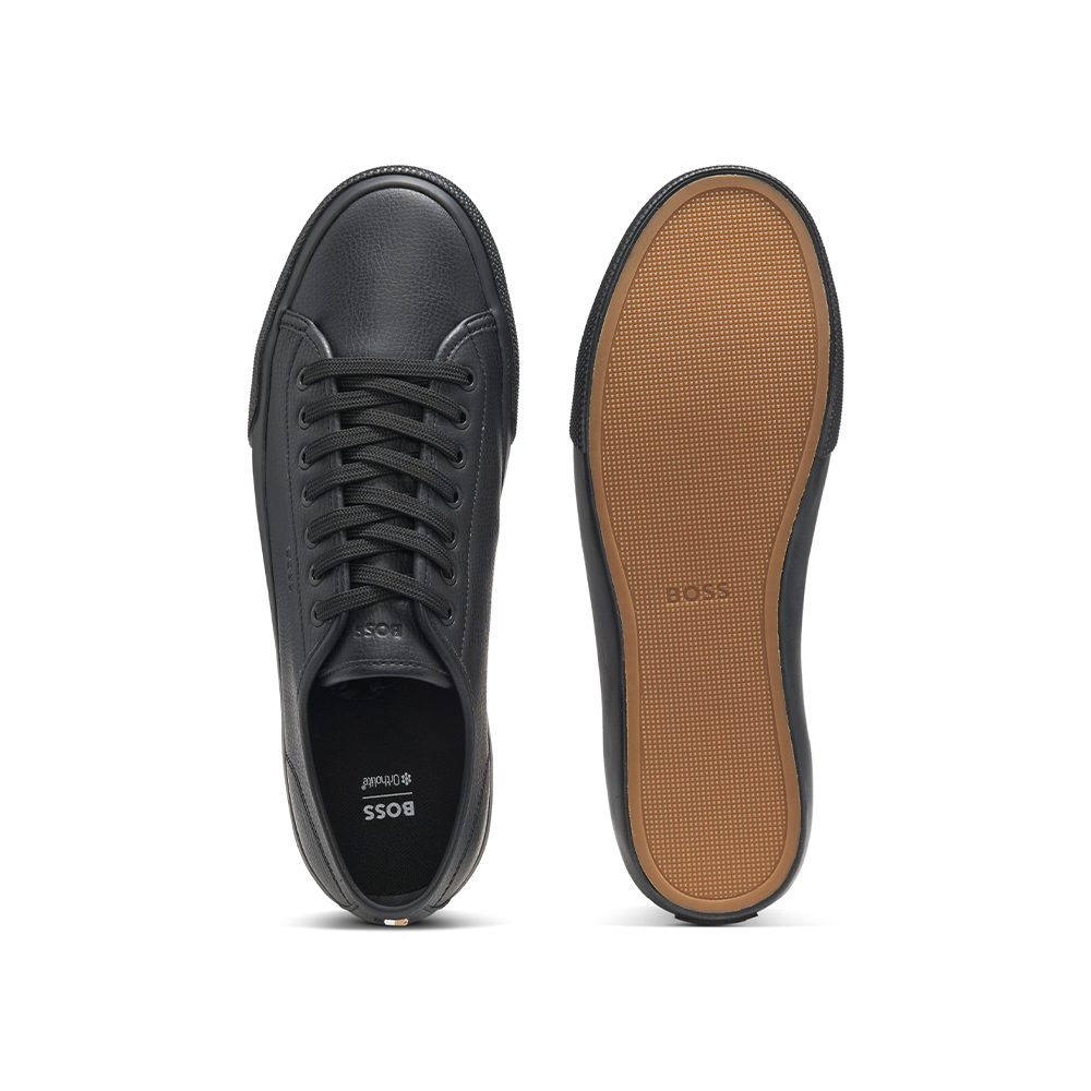 Low-top trainers in grained faux leather.