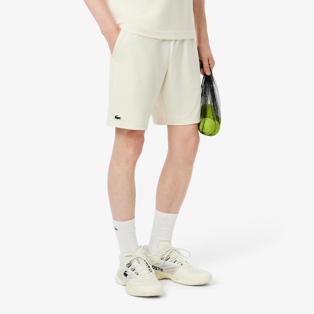 Ultra Dry Stretch Tennis Shorts.