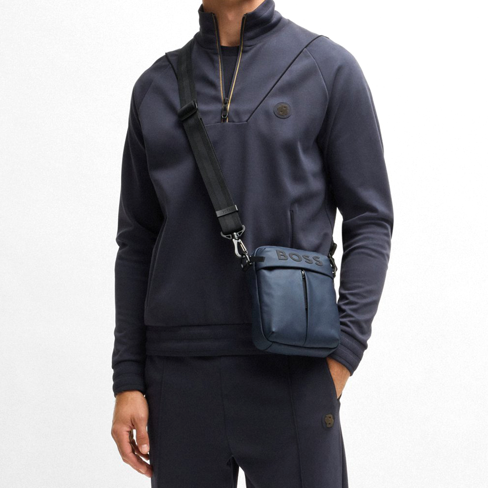 Faux-Leather Reporter Bag With Tonal Logo.