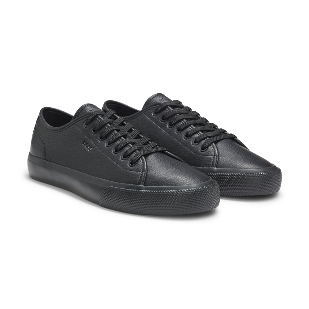 Low-top trainers in grained faux leather.