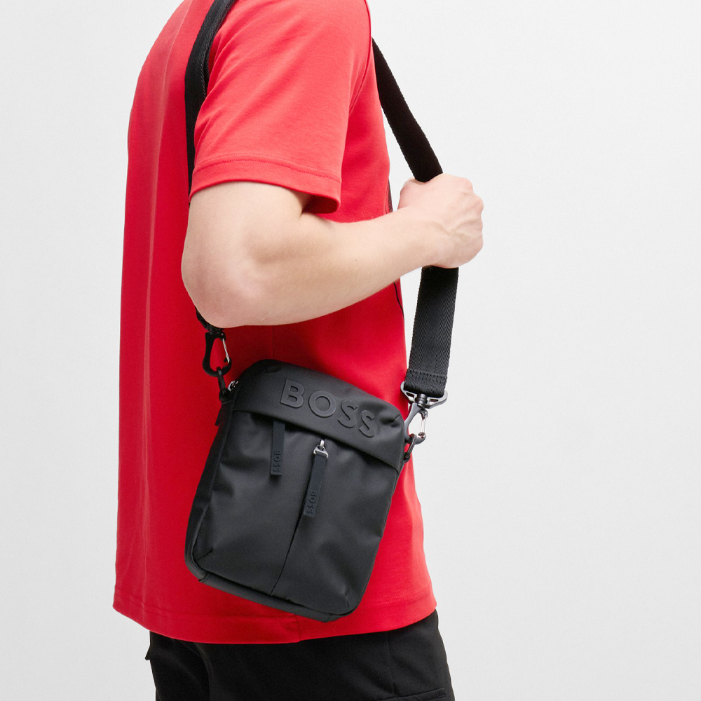 Faux-Leather Reporter Bag With Tonal Logo.