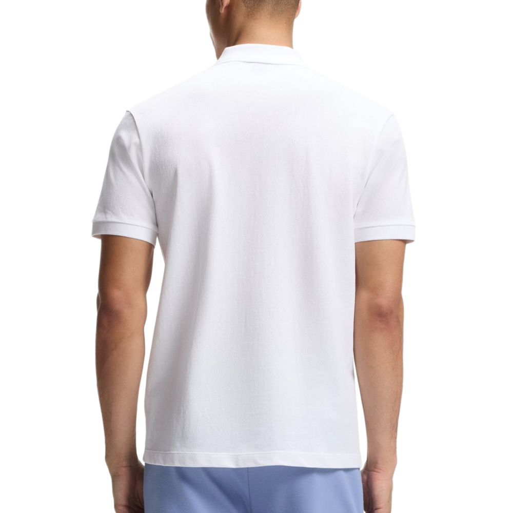 Cotton mesh polo shirt with embroidered artistic design.